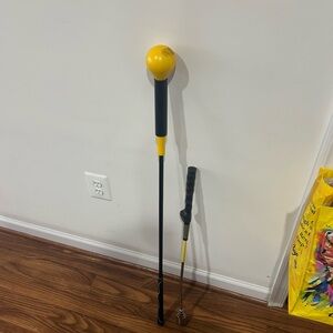 Yellow and Black Golf Swing Trainer